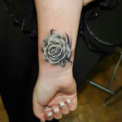 rose tattoos for women on the hand