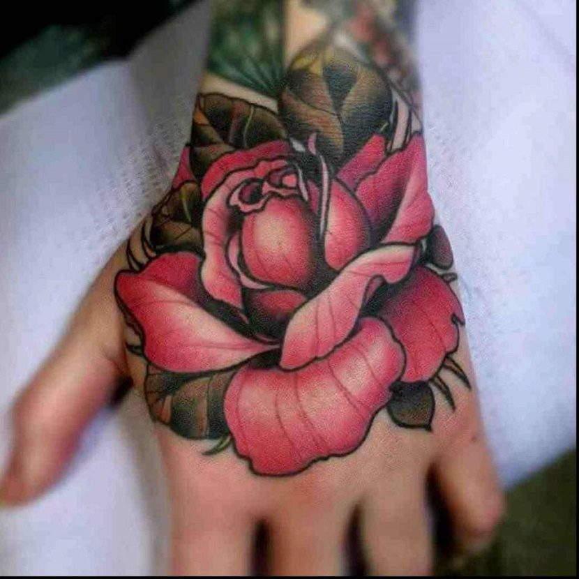 rose tattoos on female hand