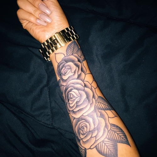 small rose tattoos on arm