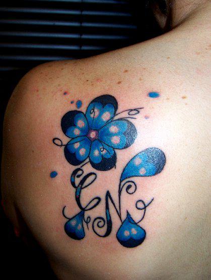 6166-tattoos-on-the-back-with-flowers-for-women-long 