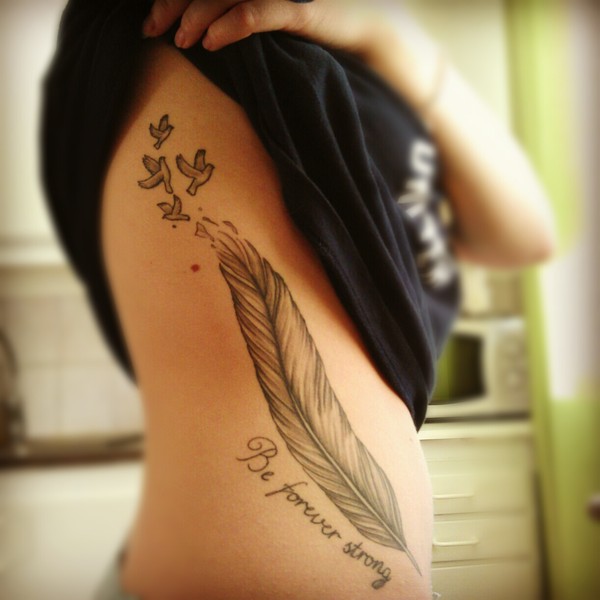 full feather tattoo with phrase