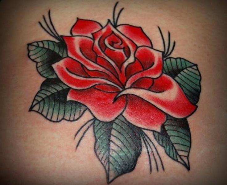 rose tattoos on woman arm