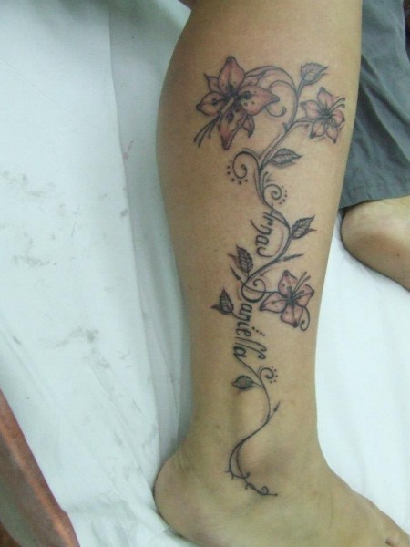 flowers with little color as a tattoo 
