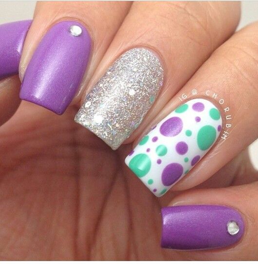 nails decorated with dots and lines