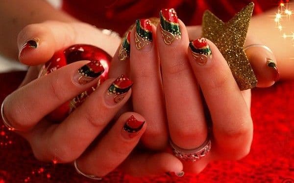 nails decorated for christmas with red