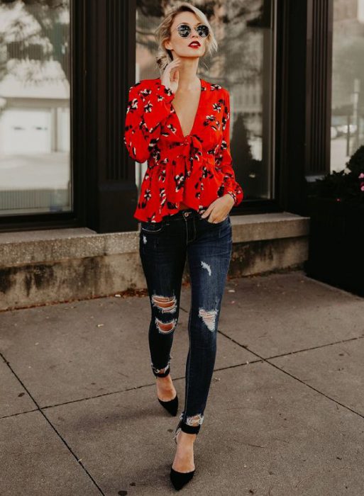 casual look with red blouse and ripped jeans