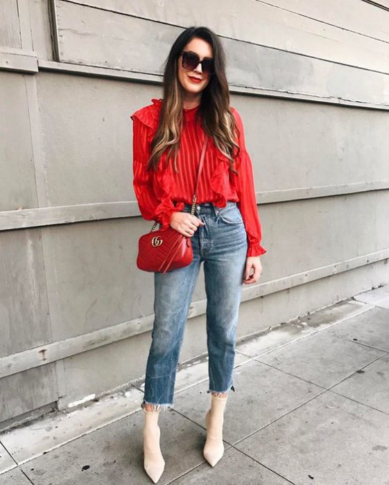 red blouse long sleeves and jeans
