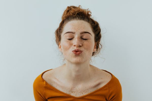 Yoga facial exercises woman kiss 