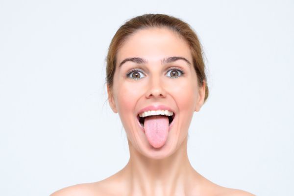 Yoga facial exercises woman tongue 