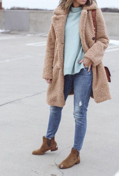 beige jacket and casual jeans