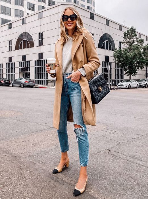 beige ripped and covered jeans