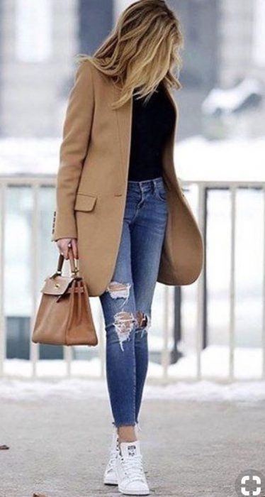 beige jacket and jeans