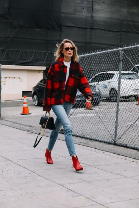 red plaid jacket and jeans