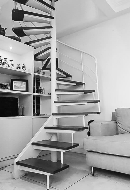 black and white snail staircase to the loft