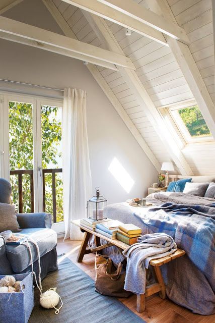 loft in white painted wood as bedroom