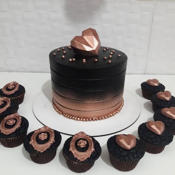 rosé gold cake with black