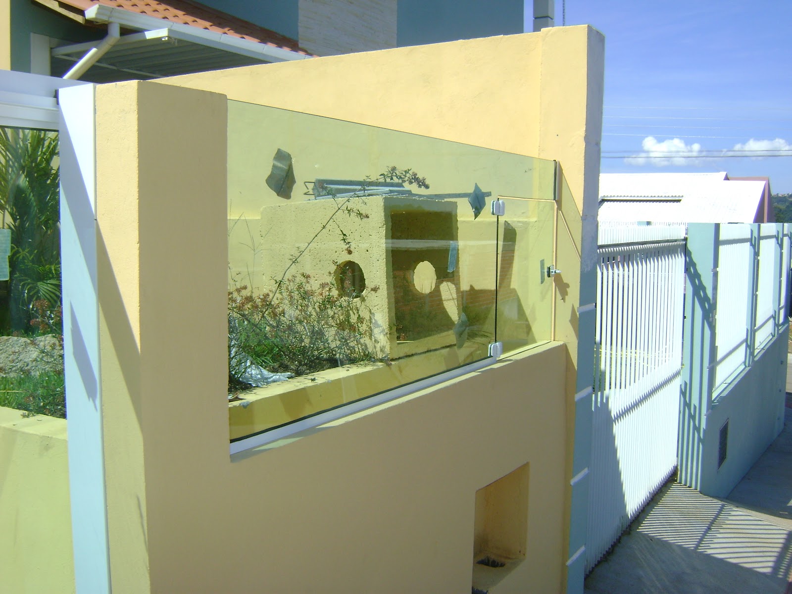 Glass wall with recycle bin