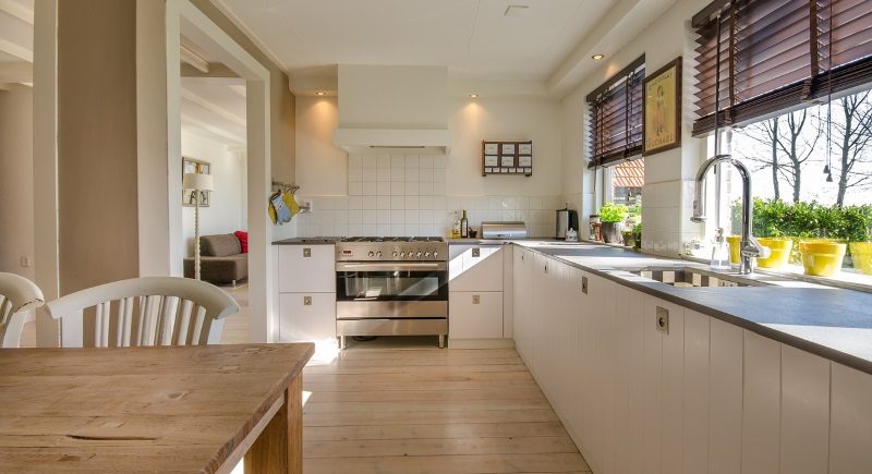 interior made of light wood with white furniture