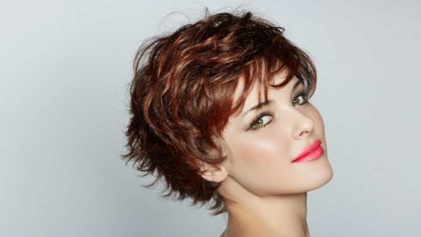 Haircuts for elongated face asymmetrical bangs short hair 