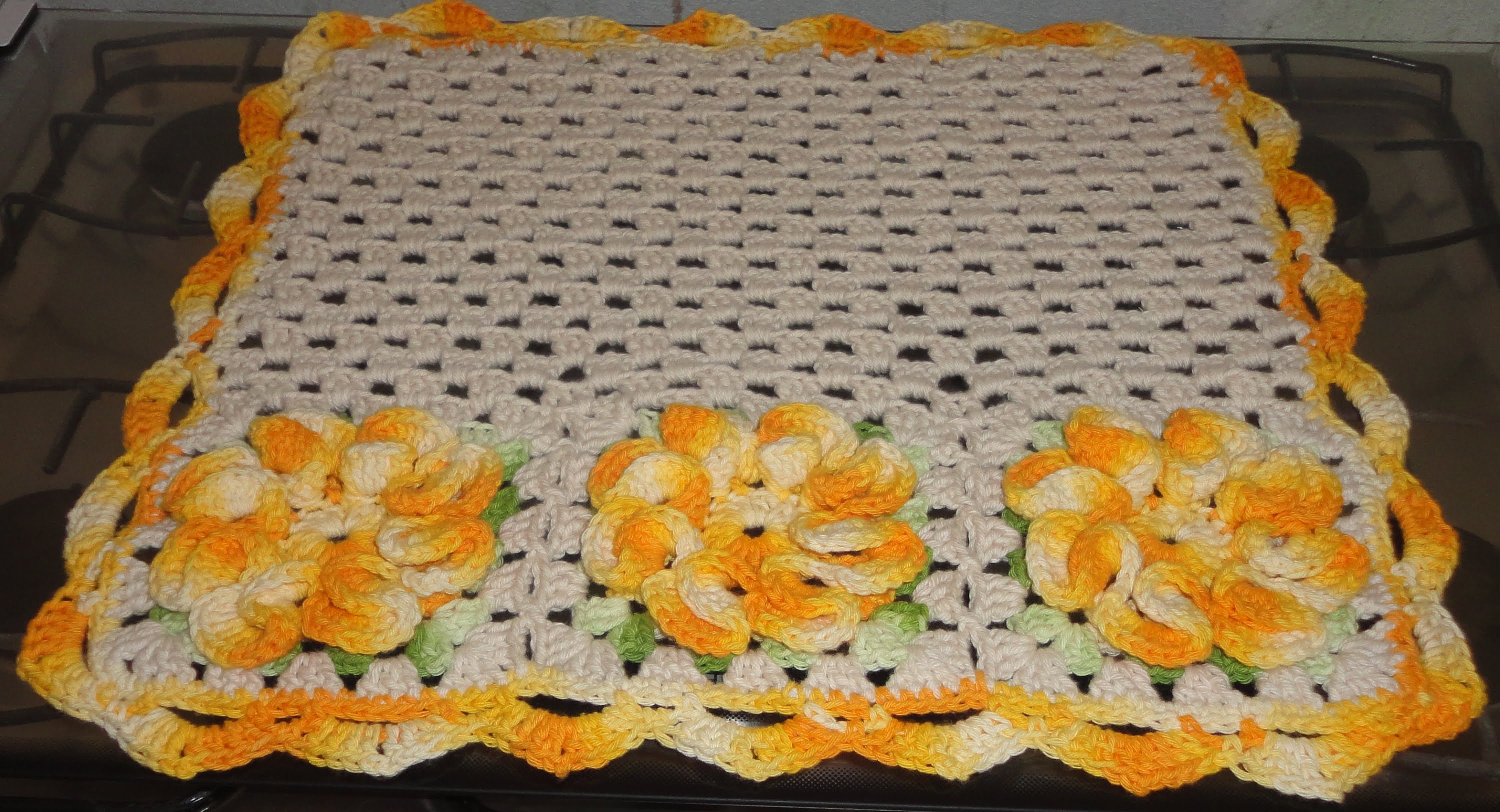 Yellow stove crochet towel