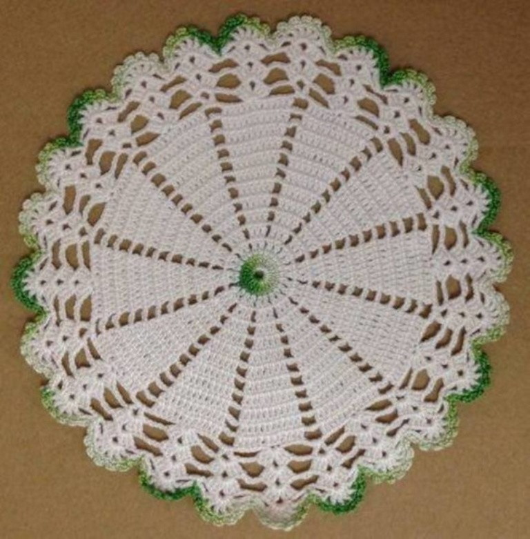 green and white crochet towel