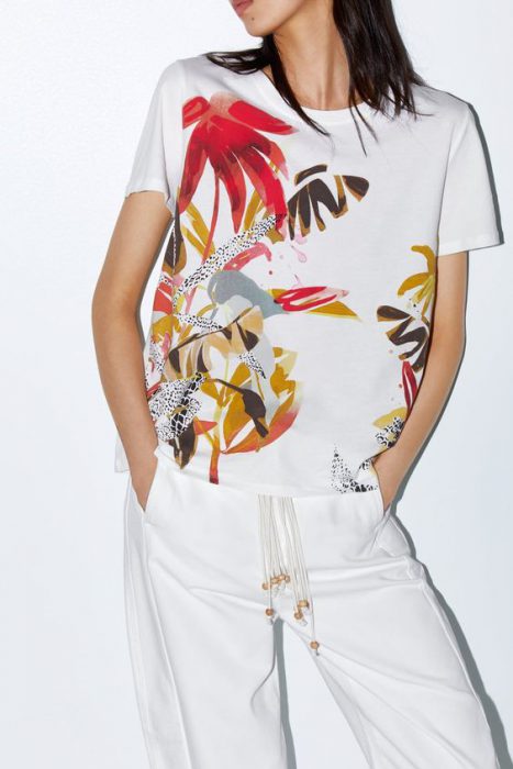 printed blouse with white spring pants