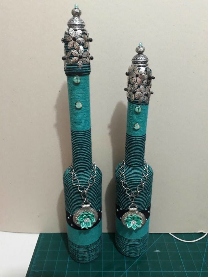 Elongated decorated bottles