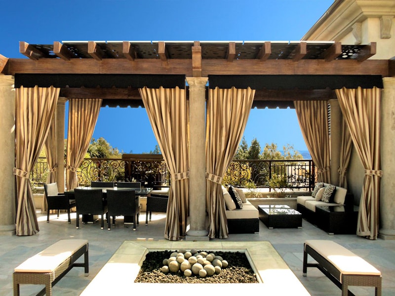 Pergola with golden curtain