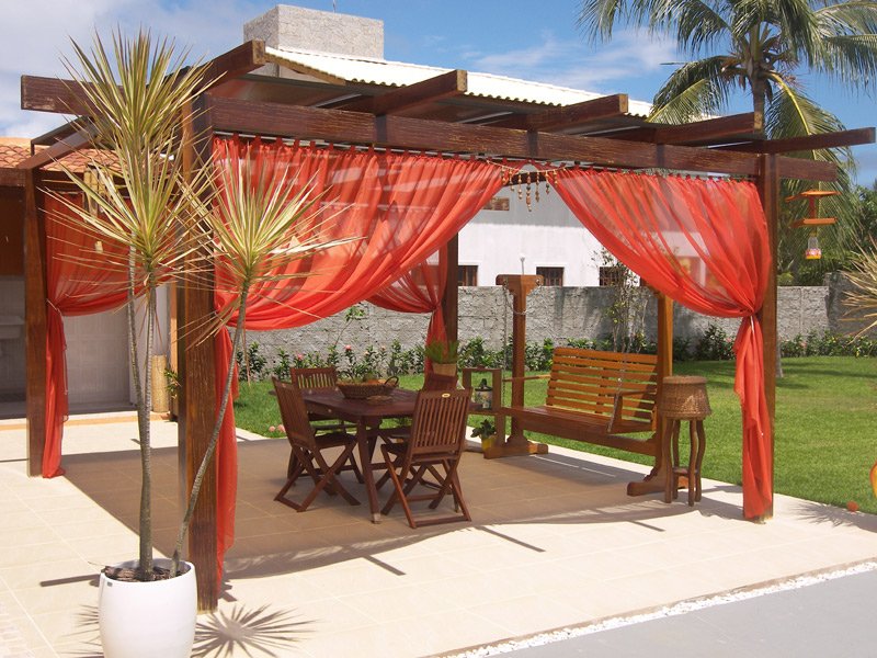 Pergola with red curtain