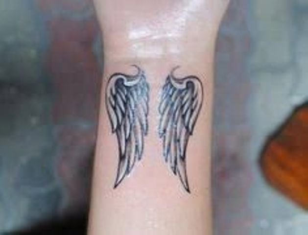 wings women - wings tattoos