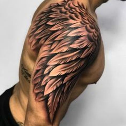 wings on arm - wing tattoos