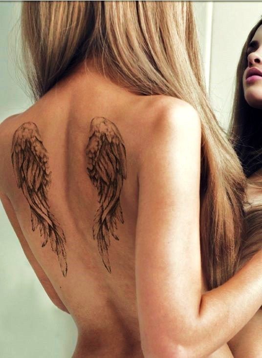 on the back - Wings tattoos
