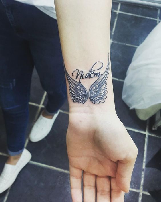 wings with names - wings tattoos