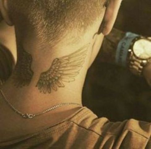 wings on neck 1 - Wings tattoos