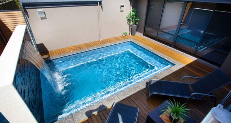 Swimming pool with small deck