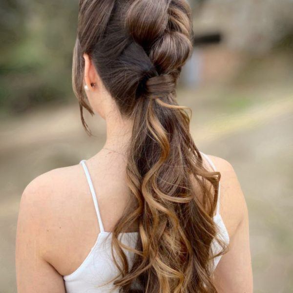 Trendy hairstyles in tik tok wavy hair ponytail 