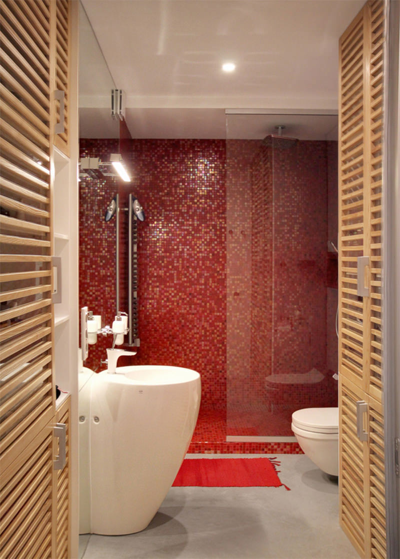 red bathroom with wood accents