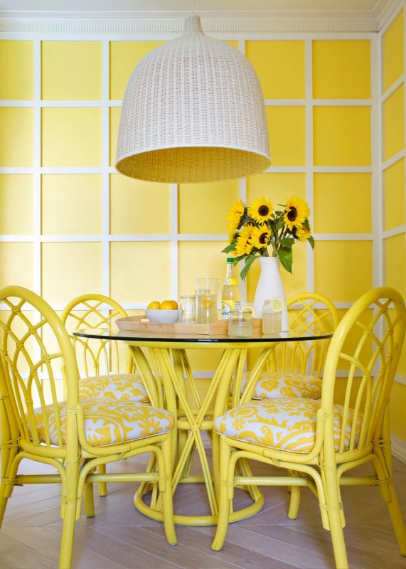 table with yellow chairs