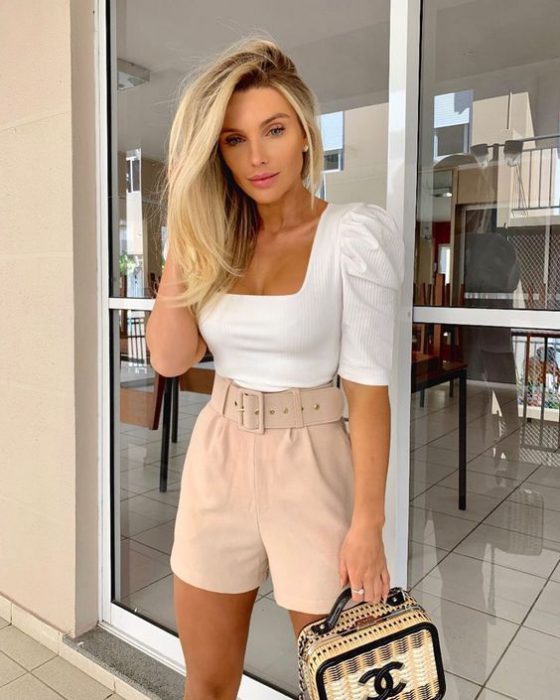 beige shorts and white blouse