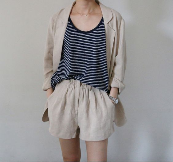 beige shorts and blue striped shirt