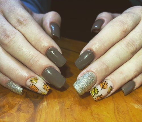 Brown nails with autumn leaves