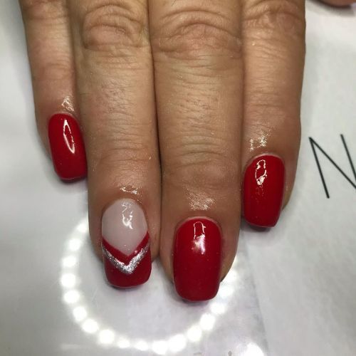 Red nails with transparency and silver detail