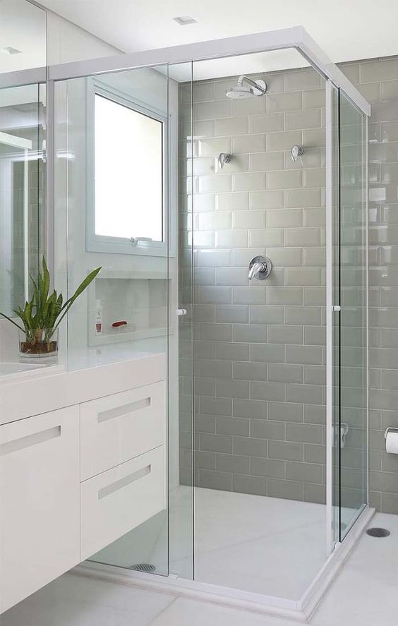 glass shower door with white accents