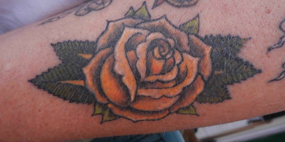 What Does A Rose Tattoo Mean On A Guy S Hand